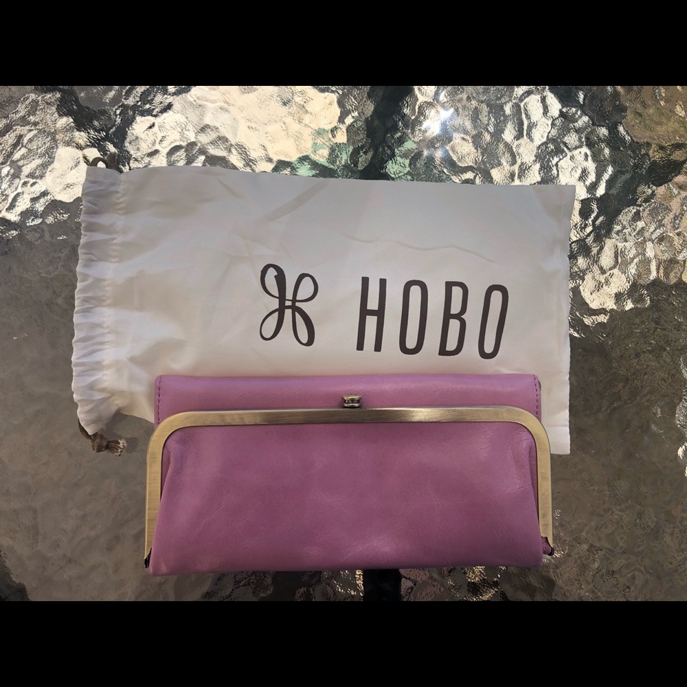 Hobo foldable wallet that is new with tags and comes with dust bag.